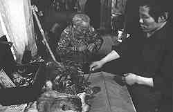 Tubyaku is
prepearing for ritual. Photo by H. Relve 1989.